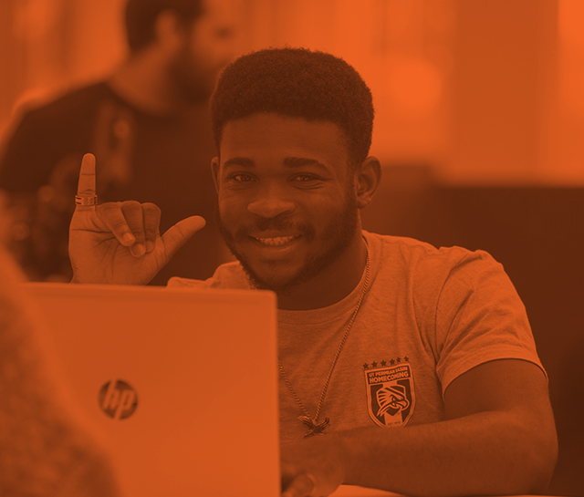 Falcon Up hands from a student on campus