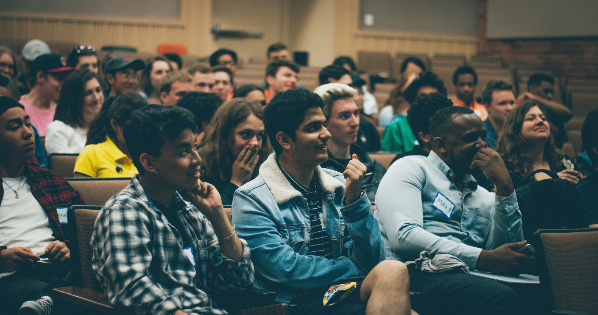 学生s sitting in lecture hall