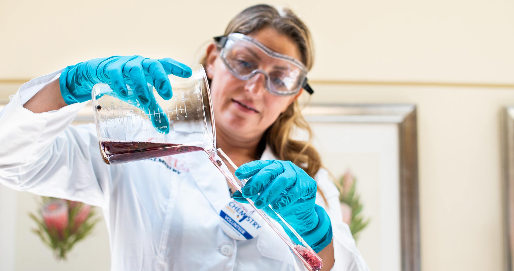 Milka Montes performing a chemistry experiment