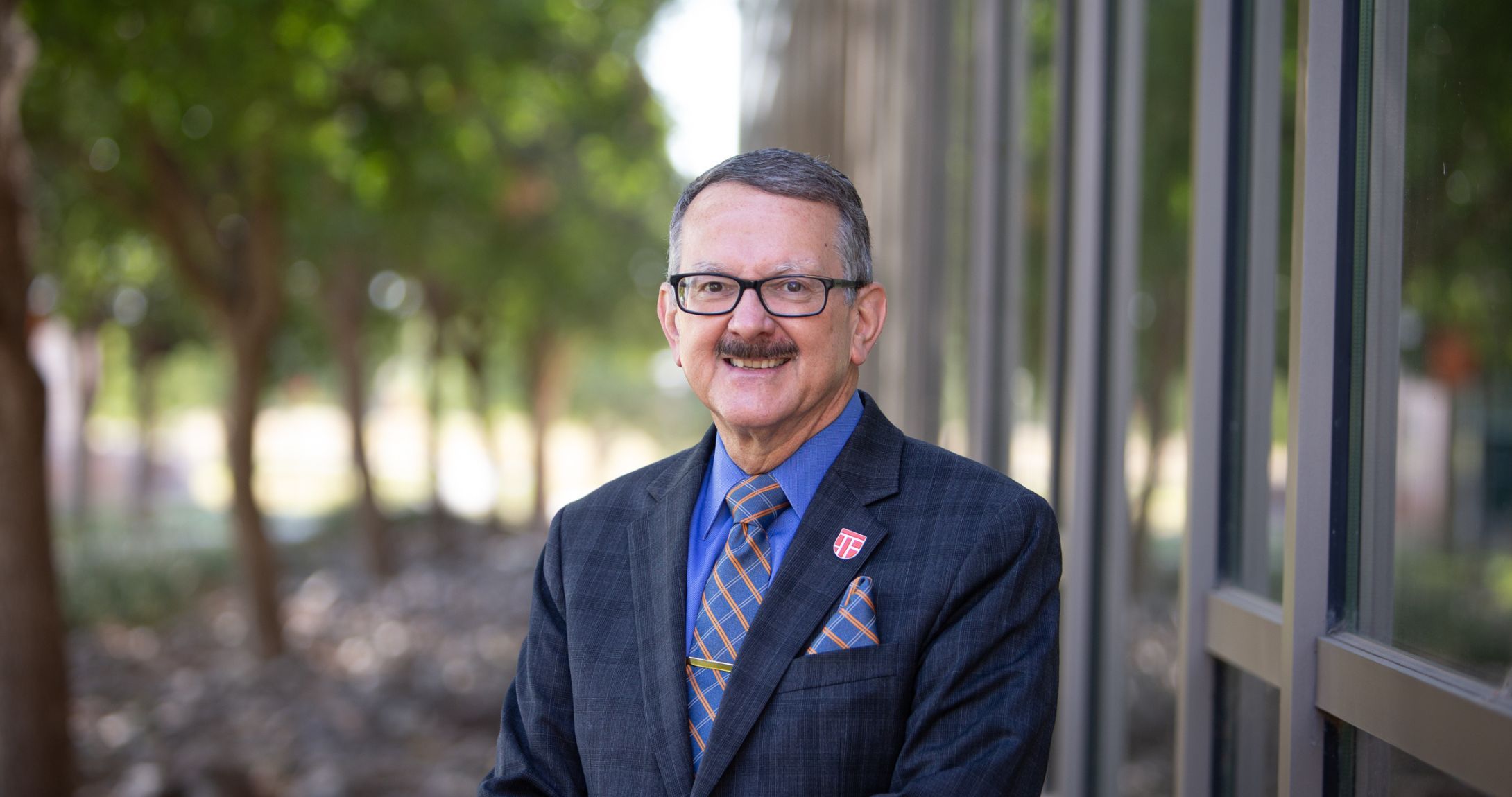 Dr. Daniel, College of Education Dean posing