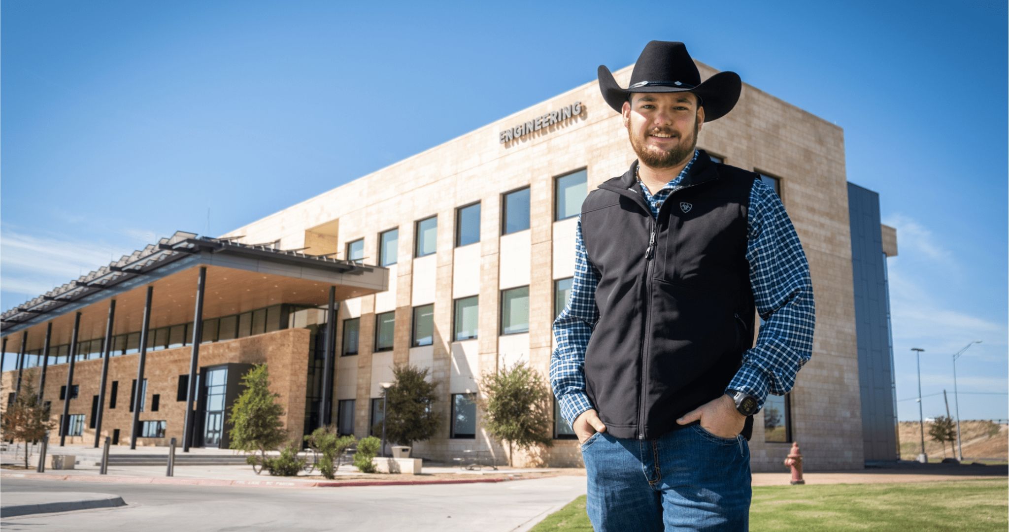 Garrett Tatum posed in front of the engineering building