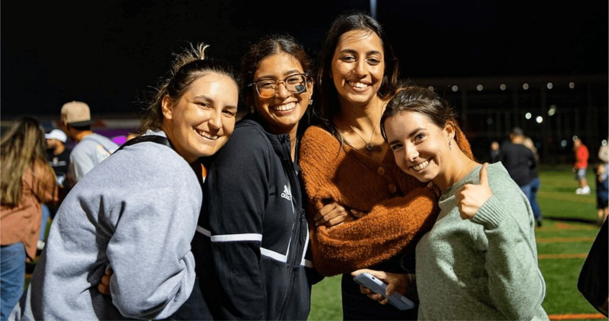 students smiling at camera
