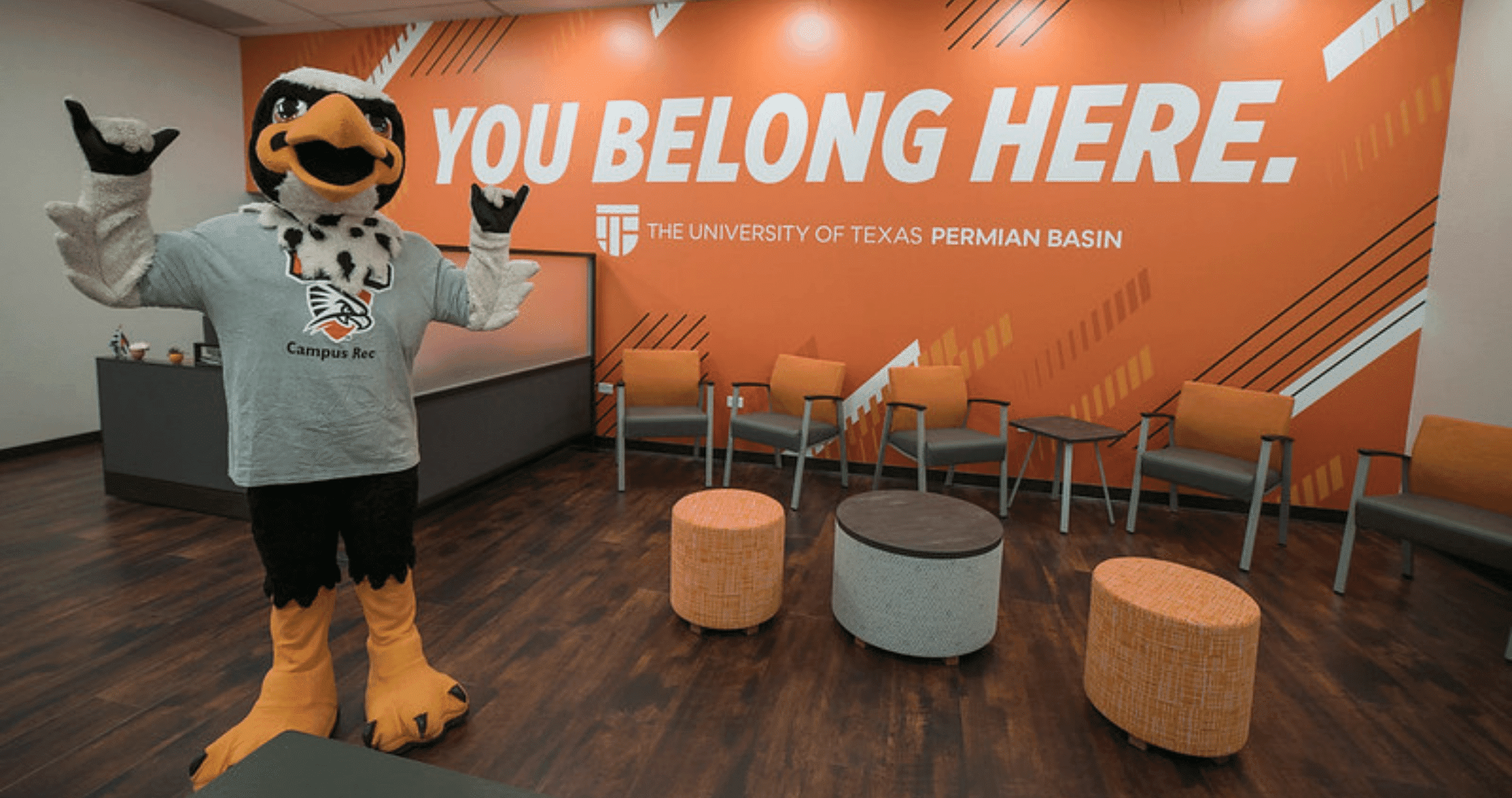 Freddy Flacon Holding a Falcons Up Sign